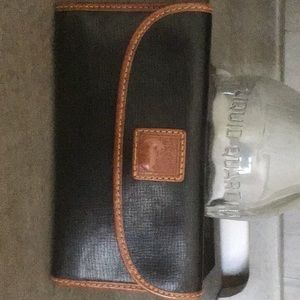 Dooney and Bourke black and saddle snap credit card and checkbook wallet.